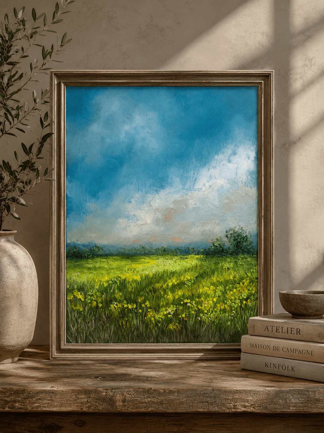 A calming original oil painting of a sunlit spring meadow, filled with wildflowers, peaceful skies and the gentle promise of summer.